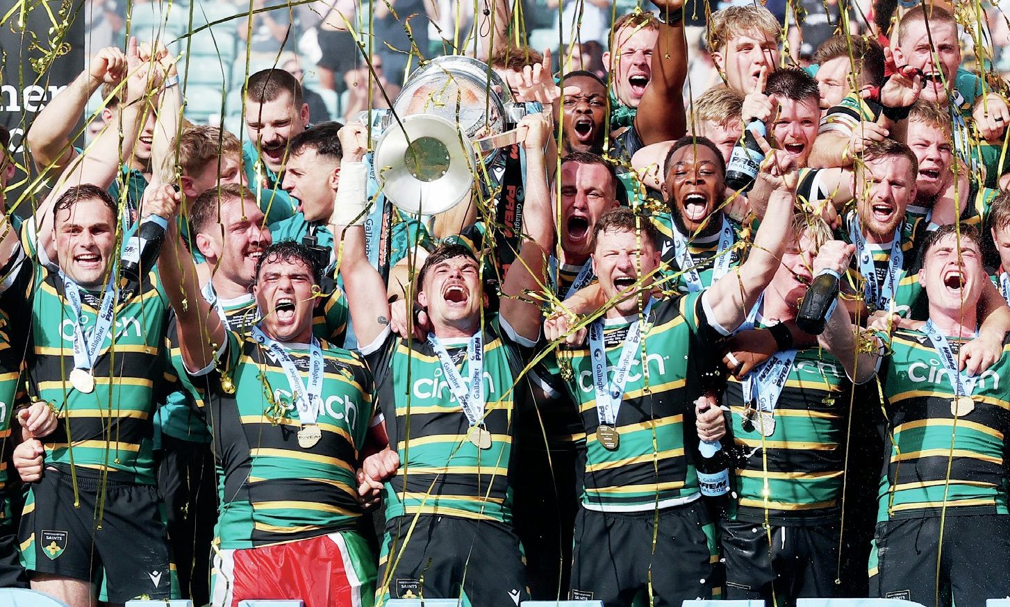Northampton Saints captain George Furbank lifts the Prem trophy