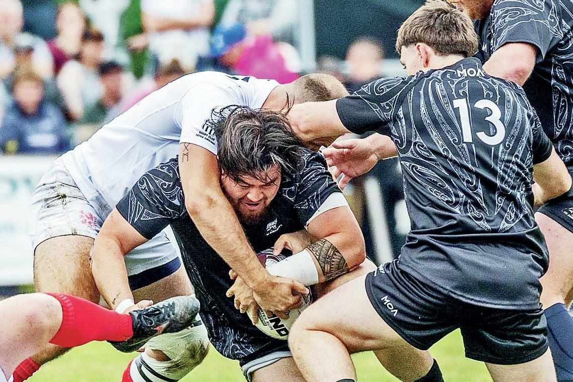 Guernsey prop Jamie Aureka Maoate-Dunn battles his way forward play again