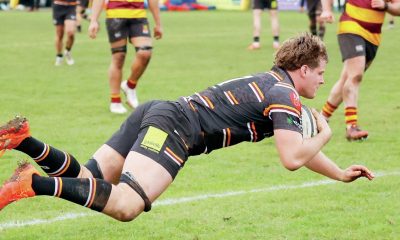 Dan Owen scoring a try for Caldy.