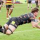 Dan Owen scoring a try for Caldy.
