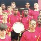 Rising star: Corpus Christi High School, Welsh Schools National U16 winners captained by Immanuel Feyi-Waboso, centre with trophy, and, inset, capped by Wales at U15 PICTURES: Corpus Christi High School