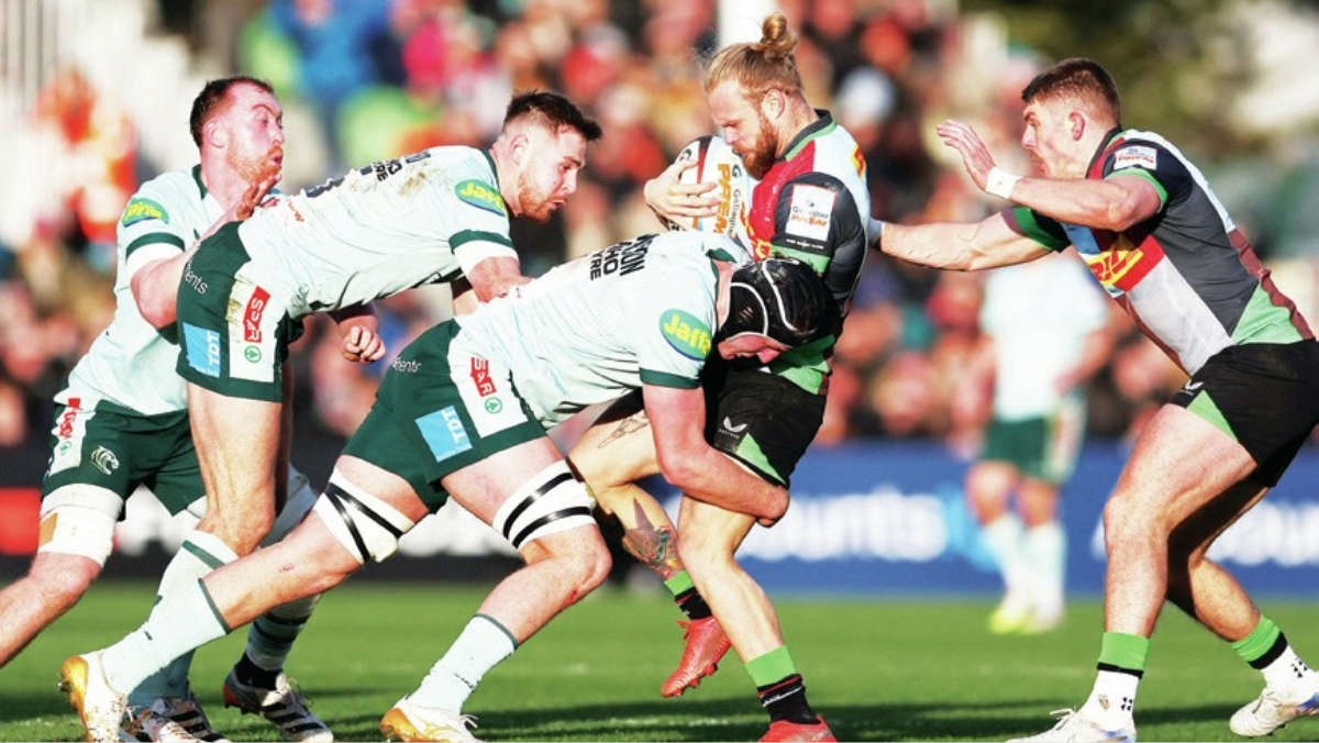 Hard going: Tyrone Green is tackled during defeat to Leicester in January